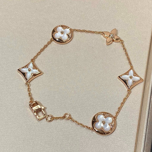 [Elite]STAR AND SUN 5 MOTIF MOP PINK GOLD BRACELET