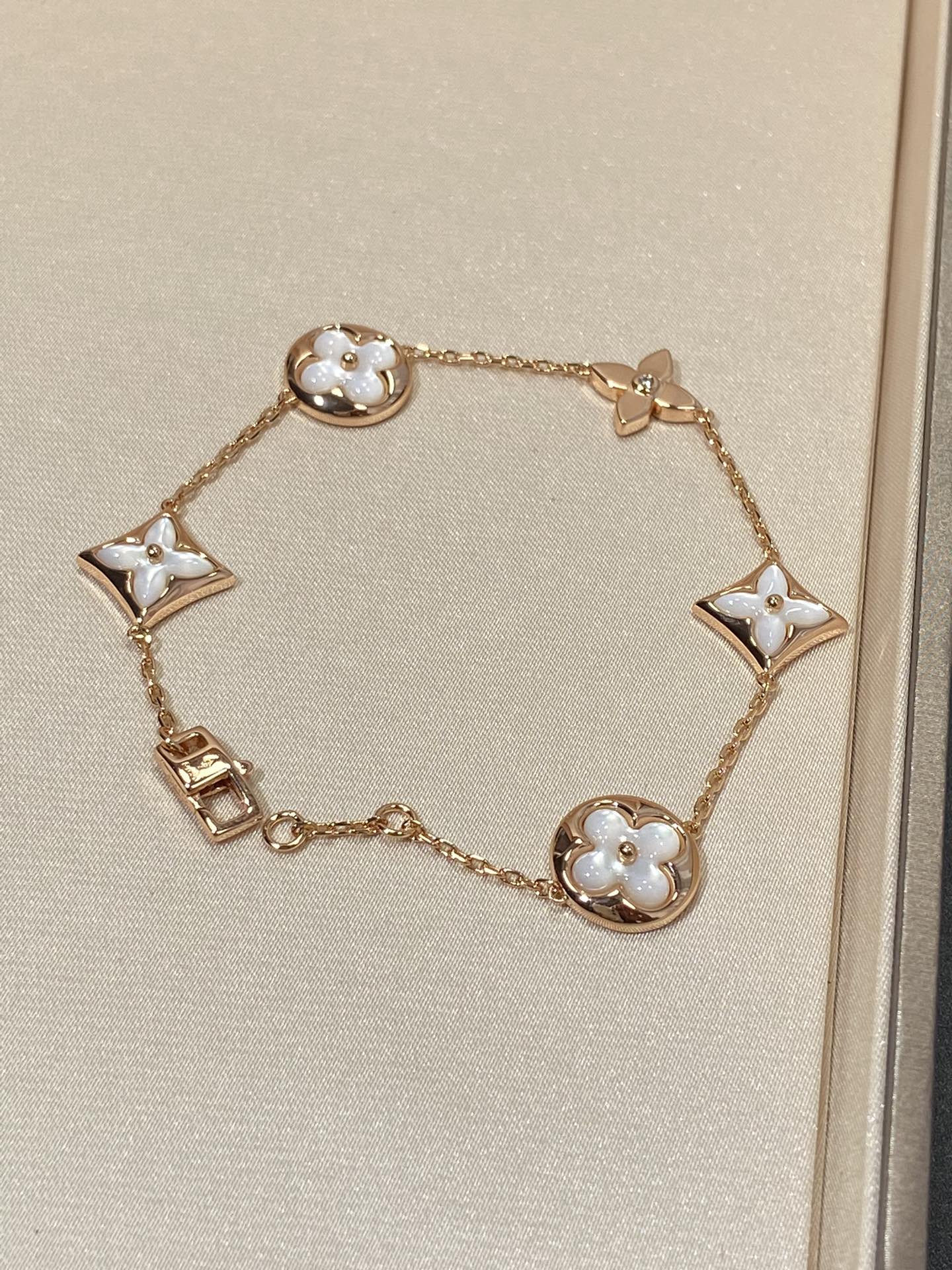 [Elite]STAR AND SUN 5 MOTIF MOP PINK GOLD BRACELET