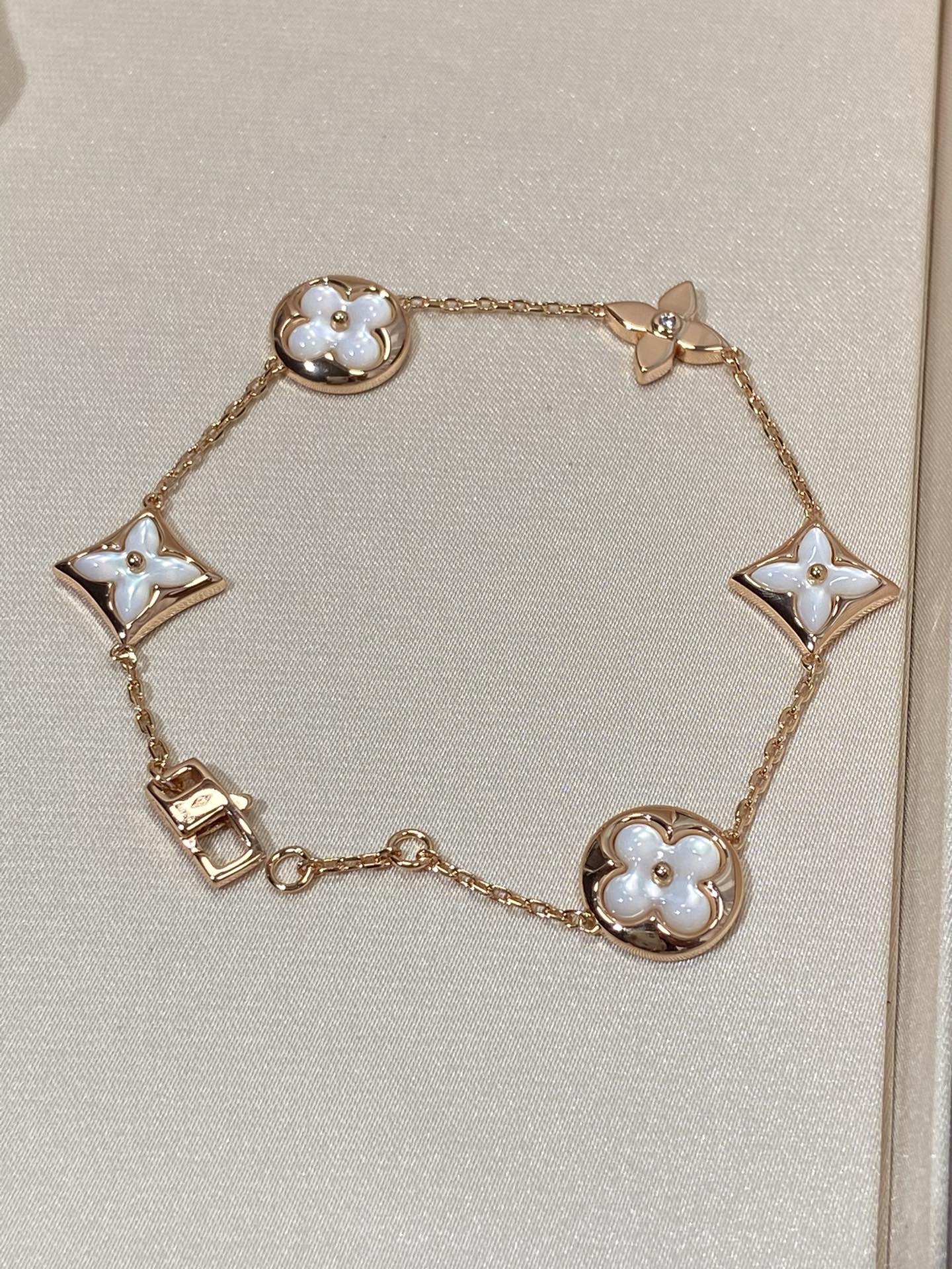 [Elite]STAR AND SUN 5 MOTIF MOP PINK GOLD BRACELET