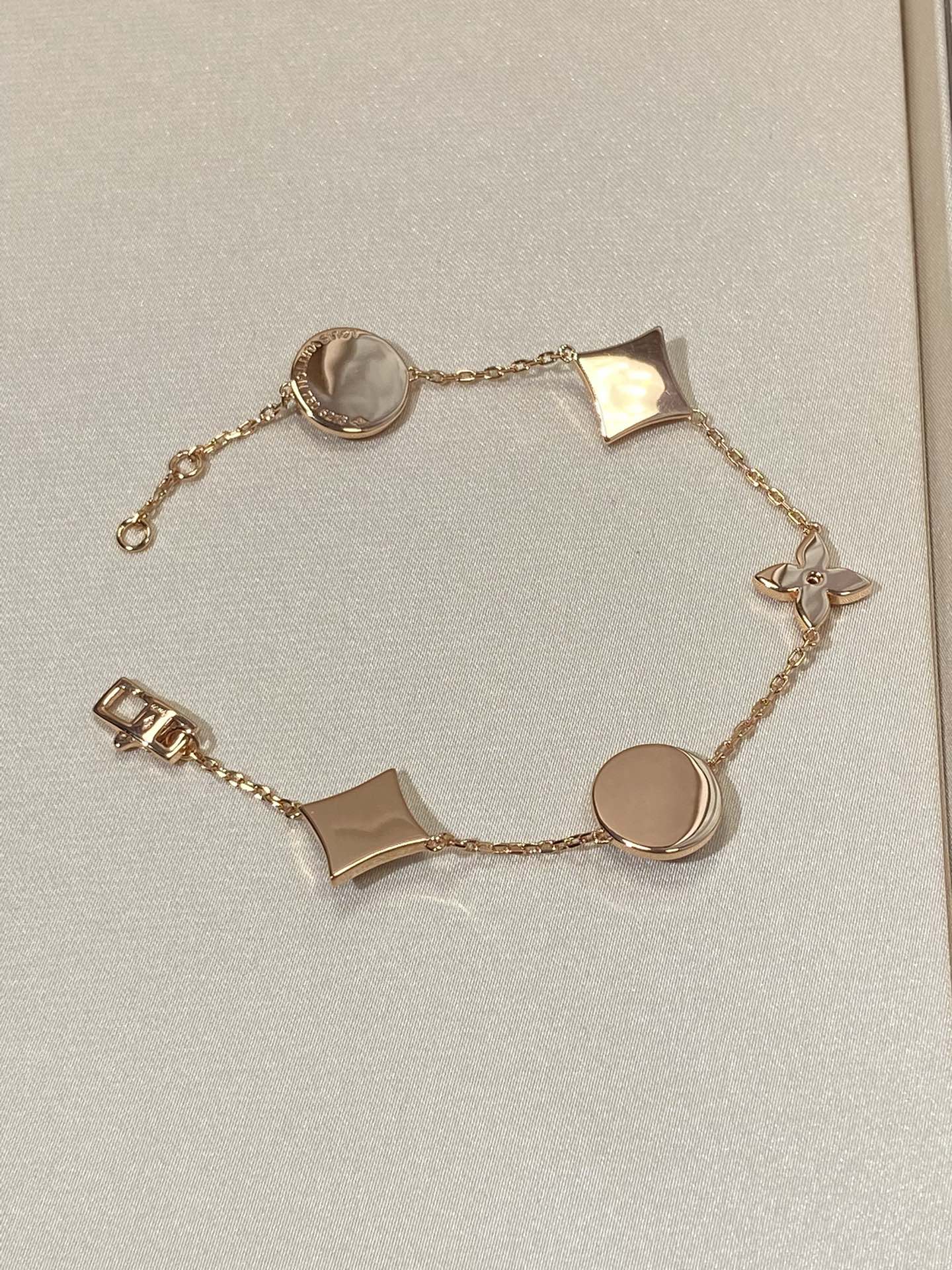 [Elite]STAR AND SUN 5 MOTIF MOP PINK GOLD BRACELET