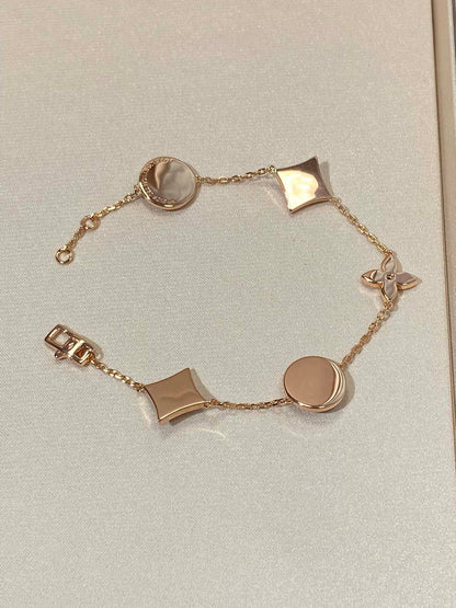 [Elite]STAR AND SUN 5 MOTIF MOP PINK GOLD BRACELET