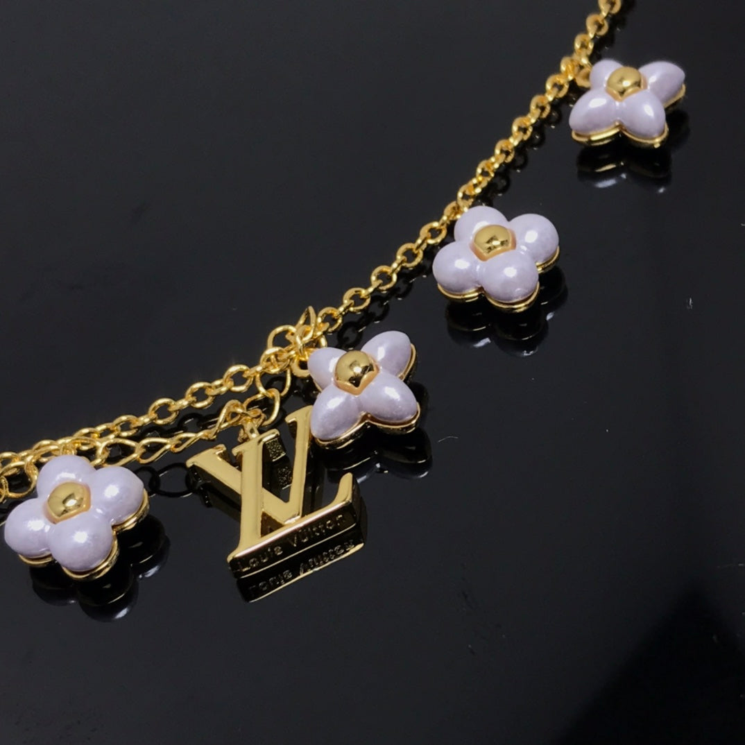 [Elite]LOGO 6 MOTIF STAR AND SUN GOLD BRACELET